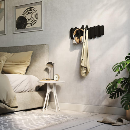 Sticks Wall Mount Coat Rack, 5 Hook Retractable Pegs, Black | Mounting Hardware Included, Sculptural Modern Design, Entryway or Bedroom Use, Recycled Plastic